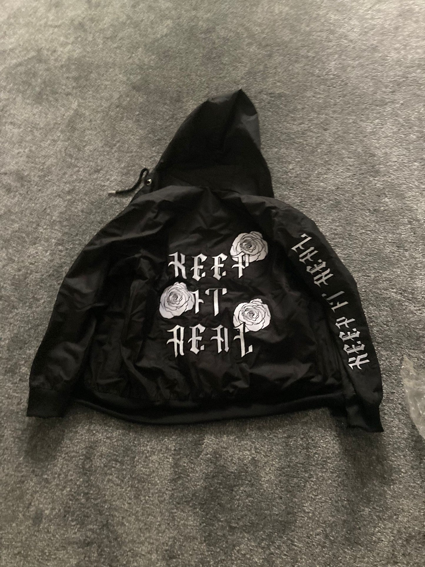 the “keep it real” windbreaker